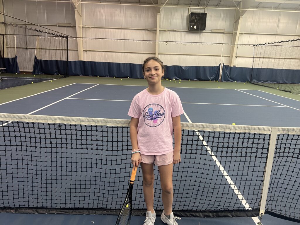 Sammi training during a junior tennis program at Alpha Tennis